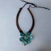 Collar flor turquesa