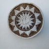Plato de fibra natural bordado estrella